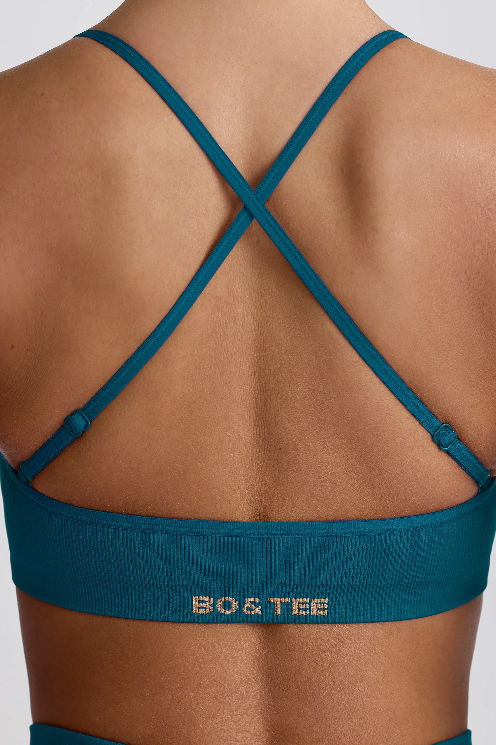 Super Sculpt Seamless Cross-Back Sports Bra in Teal - Image 7